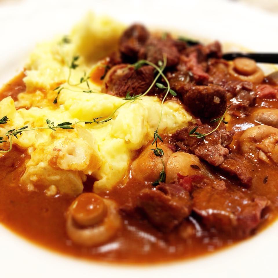 Red meat Bourguignon served with rustic mash