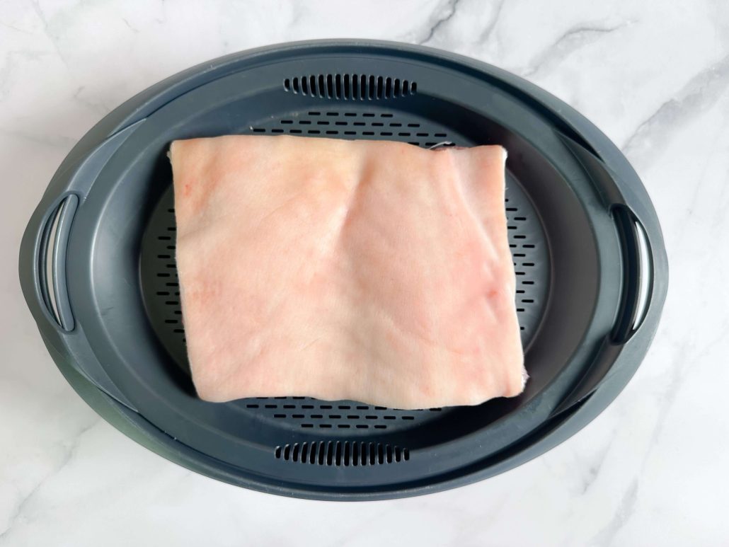 The Pork Belly is steamed in the top flat steaming tray 