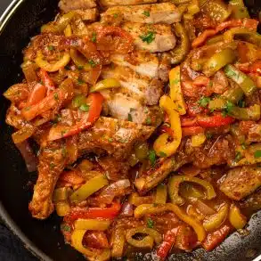 Skinnymixers Pork Chop with Peperonata from SkinnyMediterranean.