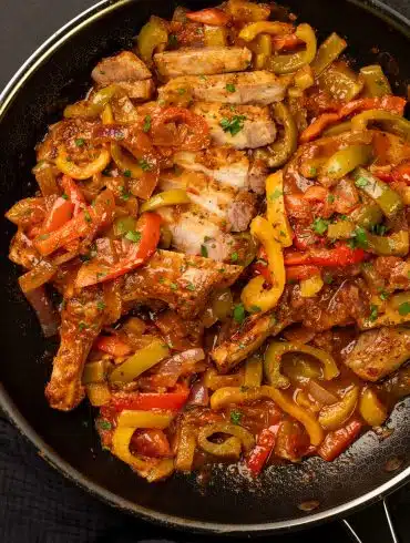 Skinnymixers Pork Chop with Peperonata from SkinnyMediterranean.