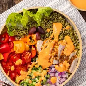 Chicken Souvlaki Spinach Rice Bowl with Spicy Feta Dressing