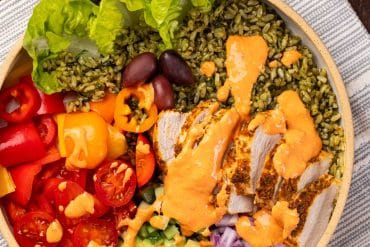 Chicken Souvlaki Spinach Rice Bowl with Spicy Feta Dressing